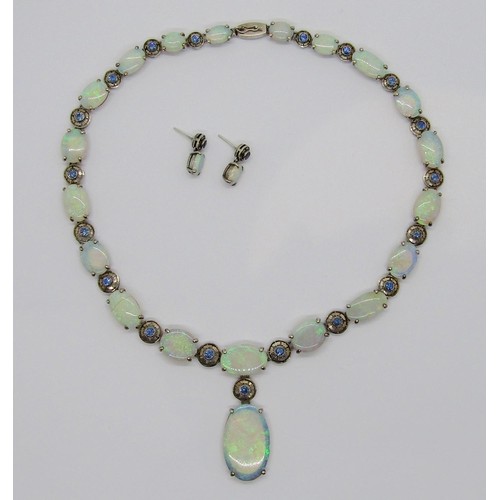 398 - Fine early 20th century opal and sapphire demi-parure comprising a graduated opal pendant necklace a... 