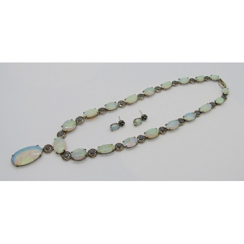 398 - Fine early 20th century opal and sapphire demi-parure comprising a graduated opal pendant necklace a... 