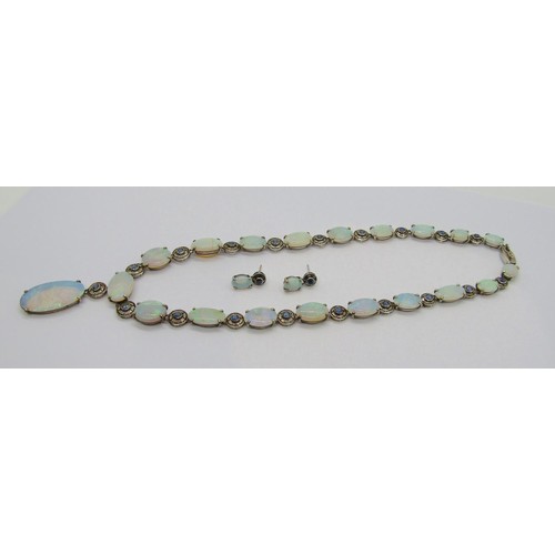 398 - Fine early 20th century opal and sapphire demi-parure comprising a graduated opal pendant necklace a... 