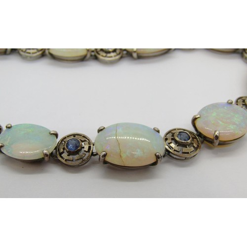 398 - Fine early 20th century opal and sapphire demi-parure comprising a graduated opal pendant necklace a... 