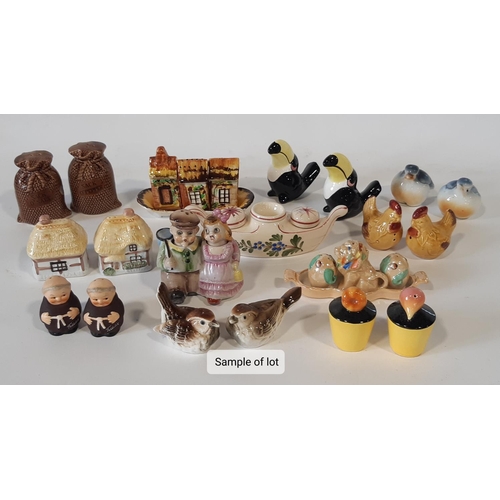 128 - An extensive collection of novelty ceramic condiment sets - some with egg cup combined, subjects to ... 