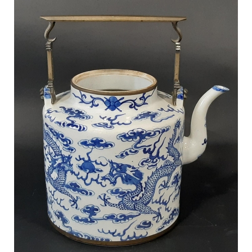 36 - A large Chinese blue and white export porcelain tea pot (lacking cover), with applied brass work han... 