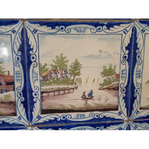 48 - A panel of fifteen 19th century Delft tiles with polychrome detail showing characters, barges, build... 