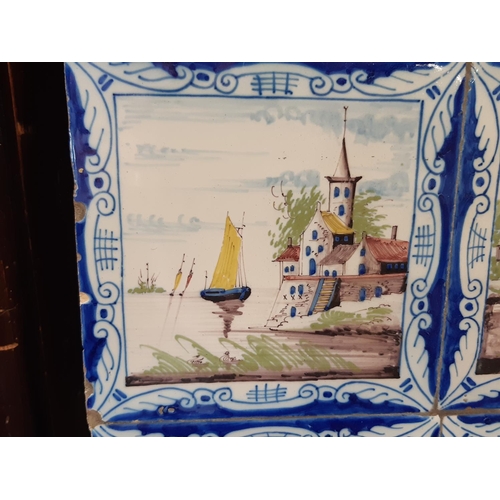 48 - A panel of fifteen 19th century Delft tiles with polychrome detail showing characters, barges, build... 