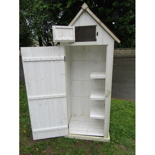 1167 - A small painted garden tool shed of tongue and groove panelled construction, painted finish and apex... 