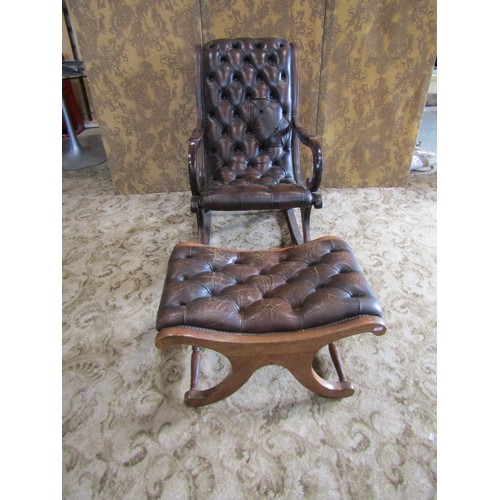 1311 - A Regency style mahogany rocking / library chair, with studded leatherette finish, together with an ... 