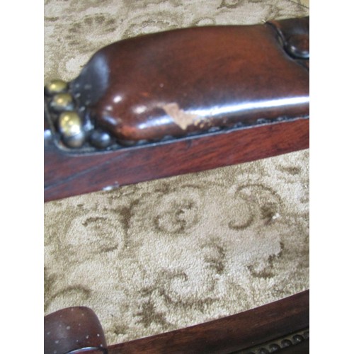 1311 - A Regency style mahogany rocking / library chair, with studded leatherette finish, together with an ... 