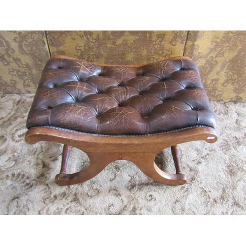 1311 - A Regency style mahogany rocking / library chair, with studded leatherette finish, together with an ... 