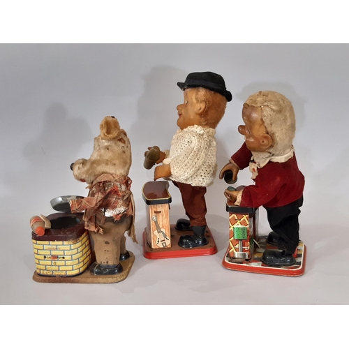 782 - Three 1960's tin plate toys comprising Charley Weaver Bartender, Burger Chef and Bartender. Untested... 