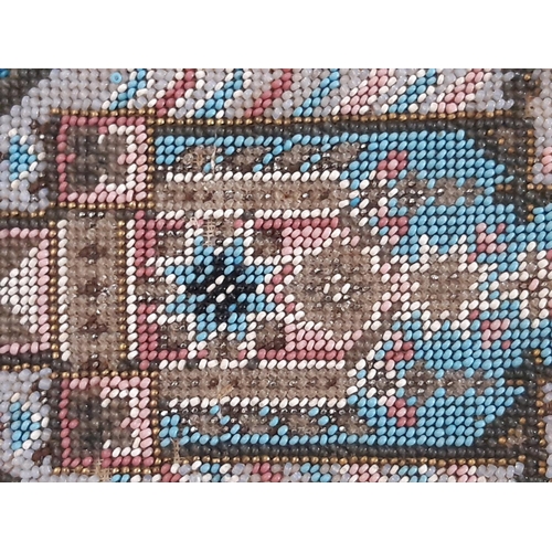 796 - Beadwork panel of repeating geometric motifs, 113x19cm