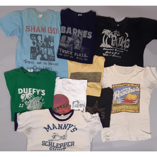 797 - 9 vintage T shirts advertising iconic bands, music venues and related industries including Sham 69 B... 