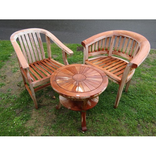 1196 - Two good quality contemporary teak garden chairs of varying design with slatted seats and backs toge... 