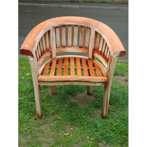 1196 - Two good quality contemporary teak garden chairs of varying design with slatted seats and backs toge... 