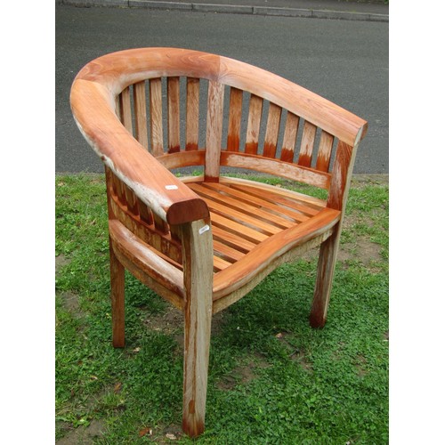 1196 - Two good quality contemporary teak garden chairs of varying design with slatted seats and backs toge... 