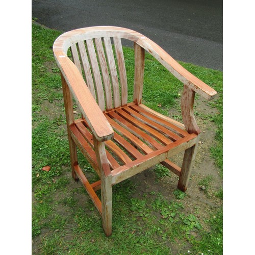 1196 - Two good quality contemporary teak garden chairs of varying design with slatted seats and backs toge... 