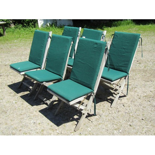 1094 - Six weathered teak folding garden chairs with slatted seats and backs (set of five plus one similar)... 