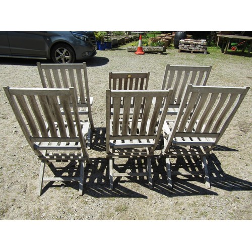 1094 - Six weathered teak folding garden chairs with slatted seats and backs (set of five plus one similar)... 