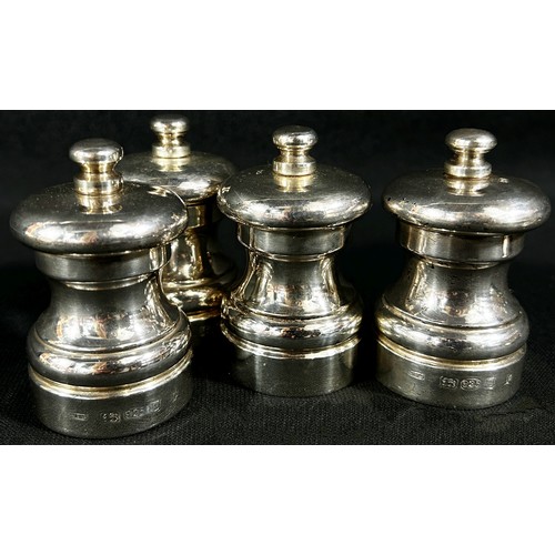 220 - Four sterling silver salt and pepper pots each stamped 925, London, makers John Ball Ltd, together w... 