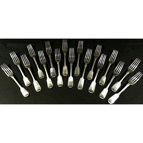 217 - Georgian and Victoria silver fiddle pattern flatware to include 18 main forks, 36 side forks, 18 des... 