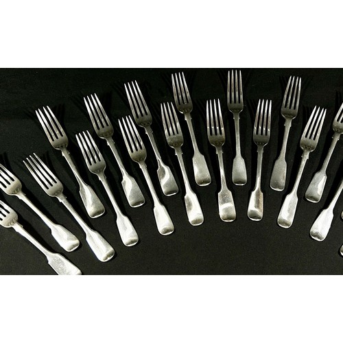 217 - Georgian and Victoria silver fiddle pattern flatware to include 18 main forks, 36 side forks, 18 des... 