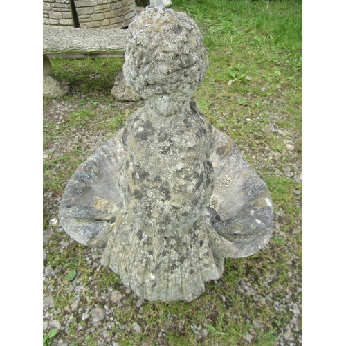 1109 - A weathered cast composition stone bird bath in the form of a shell with seated pan surmount, 75 cm ... 