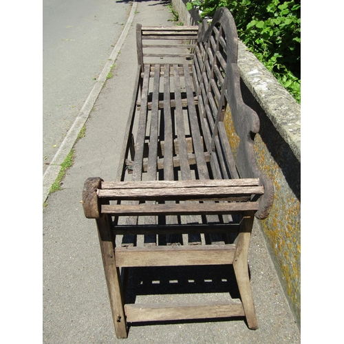 1141 - An unusually large (country house size) weathered oak Lutyens style garden bench (af), labelled to s... 