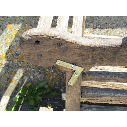 1141 - An unusually large (country house size) weathered oak Lutyens style garden bench (af), labelled to s... 