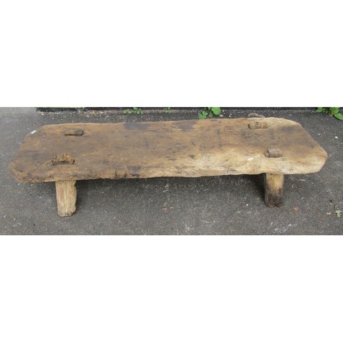 1674 - An antique dry rustic elm pig bench with through jointed tapered supports 30 cm high x 148 cm x 42 c... 