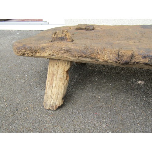 1674 - An antique dry rustic elm pig bench with through jointed tapered supports 30 cm high x 148 cm x 42 c... 