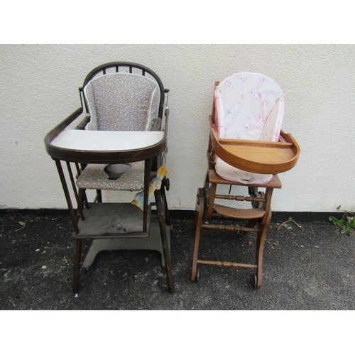 1676 - An Edwardian walnut child's high chair on swept and moulded supports united by turned stretchers tog... 