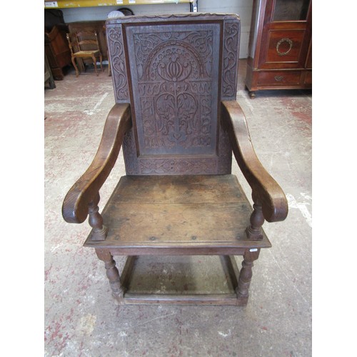 1680 - An Old English oak Wainscote type chair with rectangular carved and moulded panelled back over downs... 