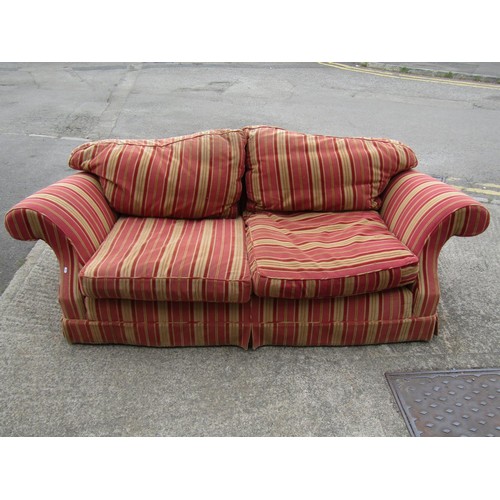 1685 - A vintage traditional sofa with swept and rolled arms, alternating pink and cream striped upholstery... 