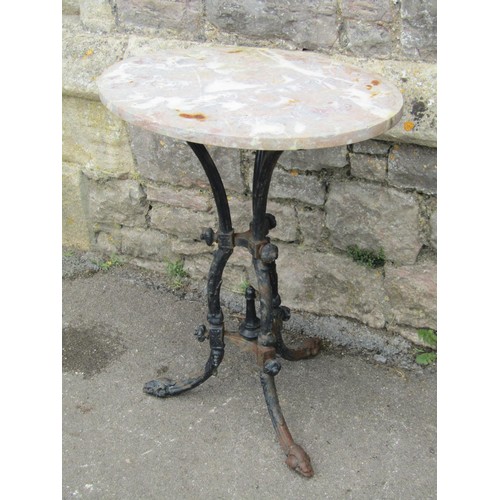 1151 - A Victorian gothic cast iron table base with acanthus detail on swept tripod supports beneath a late... 