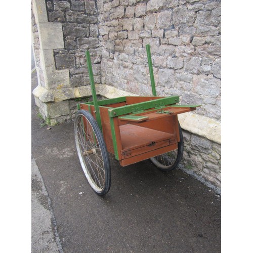 1667 - A vintage home built hand cart with original green and brown painted  finish