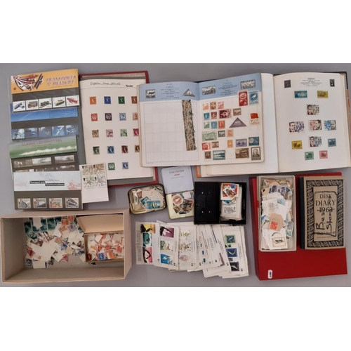 741 - Three large albums of stamps together with some loose examples, British and international, mostly mi... 