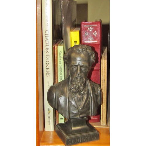 661 - A small library of books relating to Charles Dickens together with a small cast bronze bust after Er... 