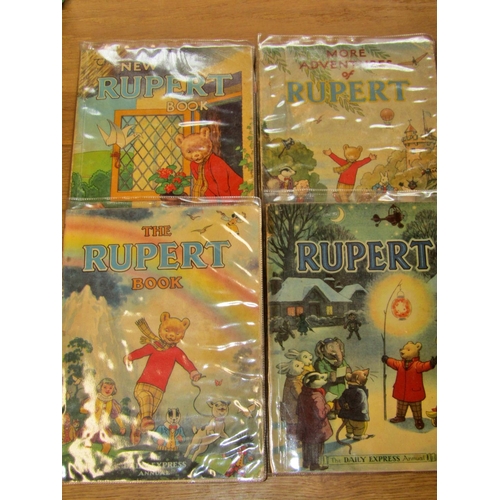 662 - Four rare editions of pre WWII Rupert The Bear Annuals (1936/7/8 and 9) together with four cloth bou... 