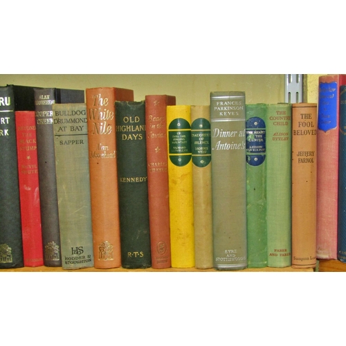 694 - A large library of literature hard backs including examples by Galsworthy, Moorehead, Shute, Rider H... 