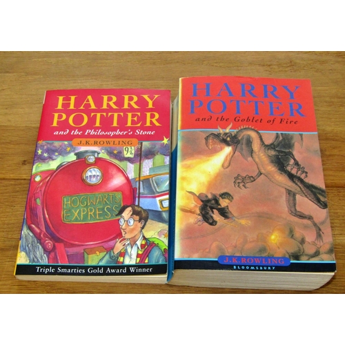 696 - Six Harry Potter paperbacks - The Philosopher's Stone (1997), 2 x The Chamber of Secrets (1998) 2 x ... 