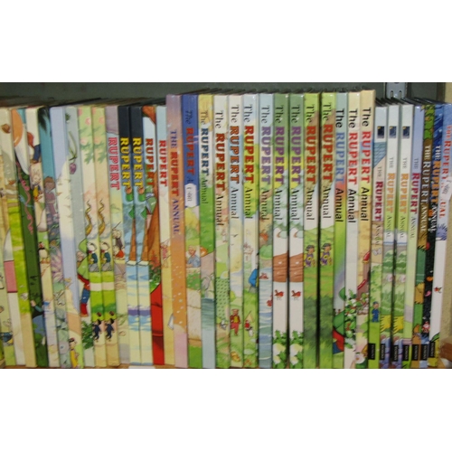 703 - Forty editions of Rupert the Bear Annuals (1980-2009 plus 2013/14/17) (some duplicates)