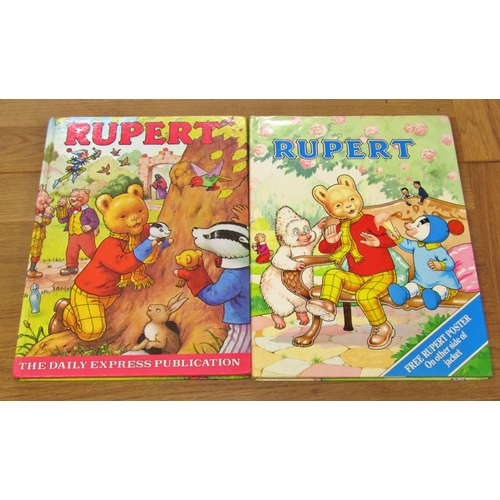 703 - Forty editions of Rupert the Bear Annuals (1980-2009 plus 2013/14/17) (some duplicates)