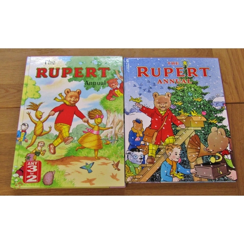 703 - Forty editions of Rupert the Bear Annuals (1980-2009 plus 2013/14/17) (some duplicates)