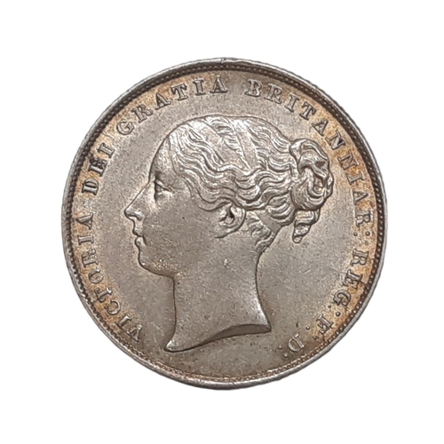 883 - Victoria (1837 - 1901) A silver shilling coin, 1853.