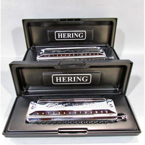 562 - A collection of seven harmonicas, including two Stan Harper Hering Chromatic 56’s, a Hering 5148, a ... 