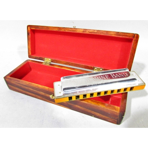 562 - A collection of seven harmonicas, including two Stan Harper Hering Chromatic 56’s, a Hering 5148, a ... 