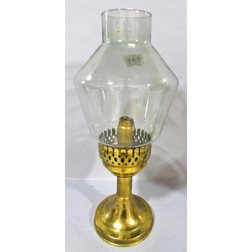 601 - A pair of brass candlesticks with smoked glass shades, together with a classical column lamp on hair... 