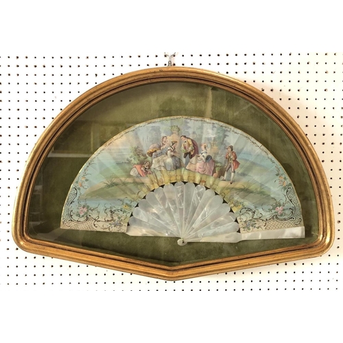 1865 - A 19th century hand-painted fan depicting a classical figurative garden scene with a mother of pearl... 