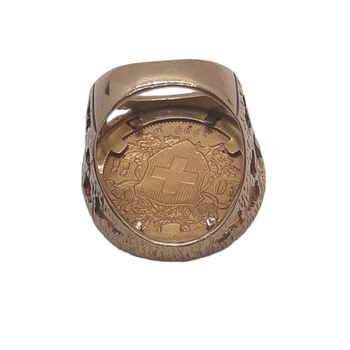 864 - A Swiss Helvetia A 20 Franc coin, 1930, mounted as a ring in 9ct yellow gold with pierced and textur... 