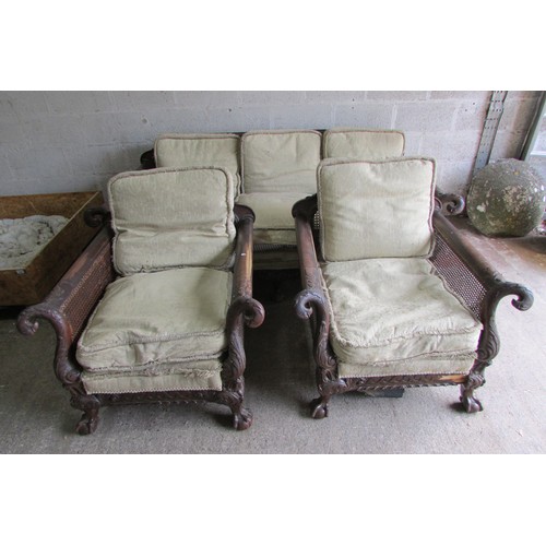 1720 - A good 19th century mahogany three piece bergere suite, the carved show wood frame with acanthus, sc... 