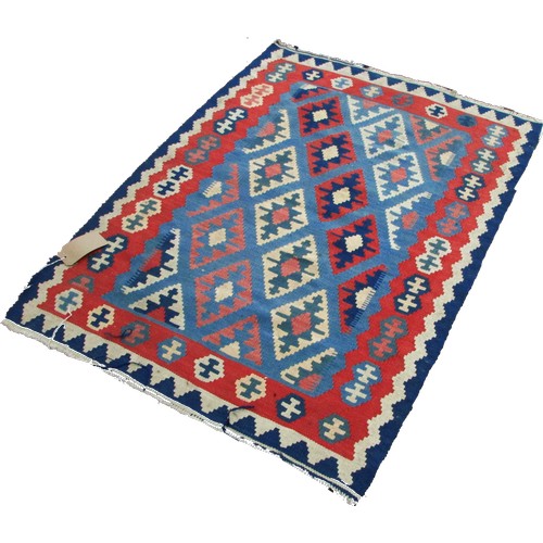 1789 - A small Kilim mat with alternating rows of diamonds on a pale blue ground, 130cm x 95cm approximatel... 